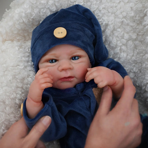 Bebê reborn Menino recem nacido de silicone com olhos azuis 48cm - Gael