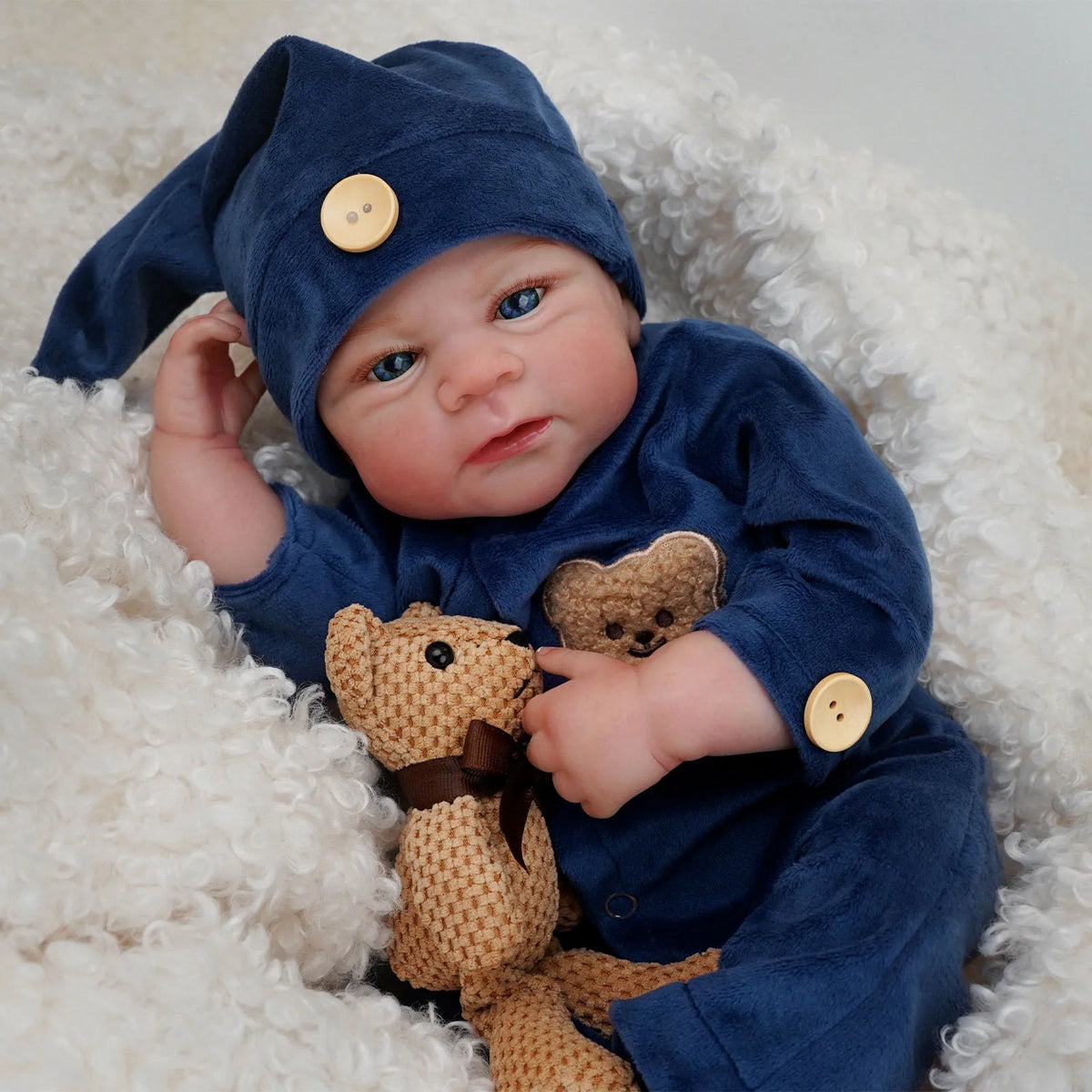Bebê reborn Menino recem nacido de silicone com olhos azuis 48cm - Gael
