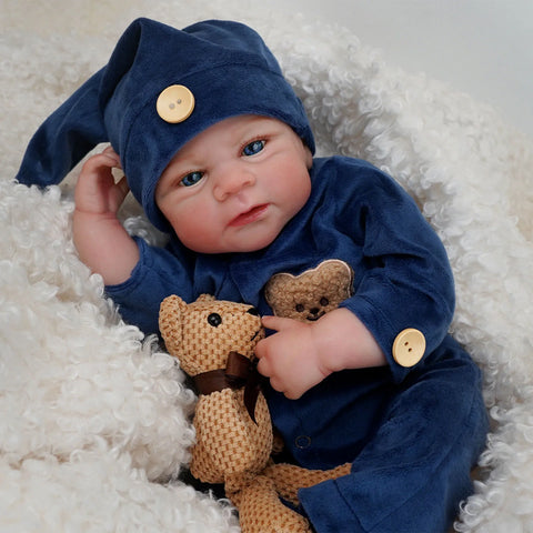 Bebê reborn Menino recem nacido de silicone com olhos azuis 48cm - Gael