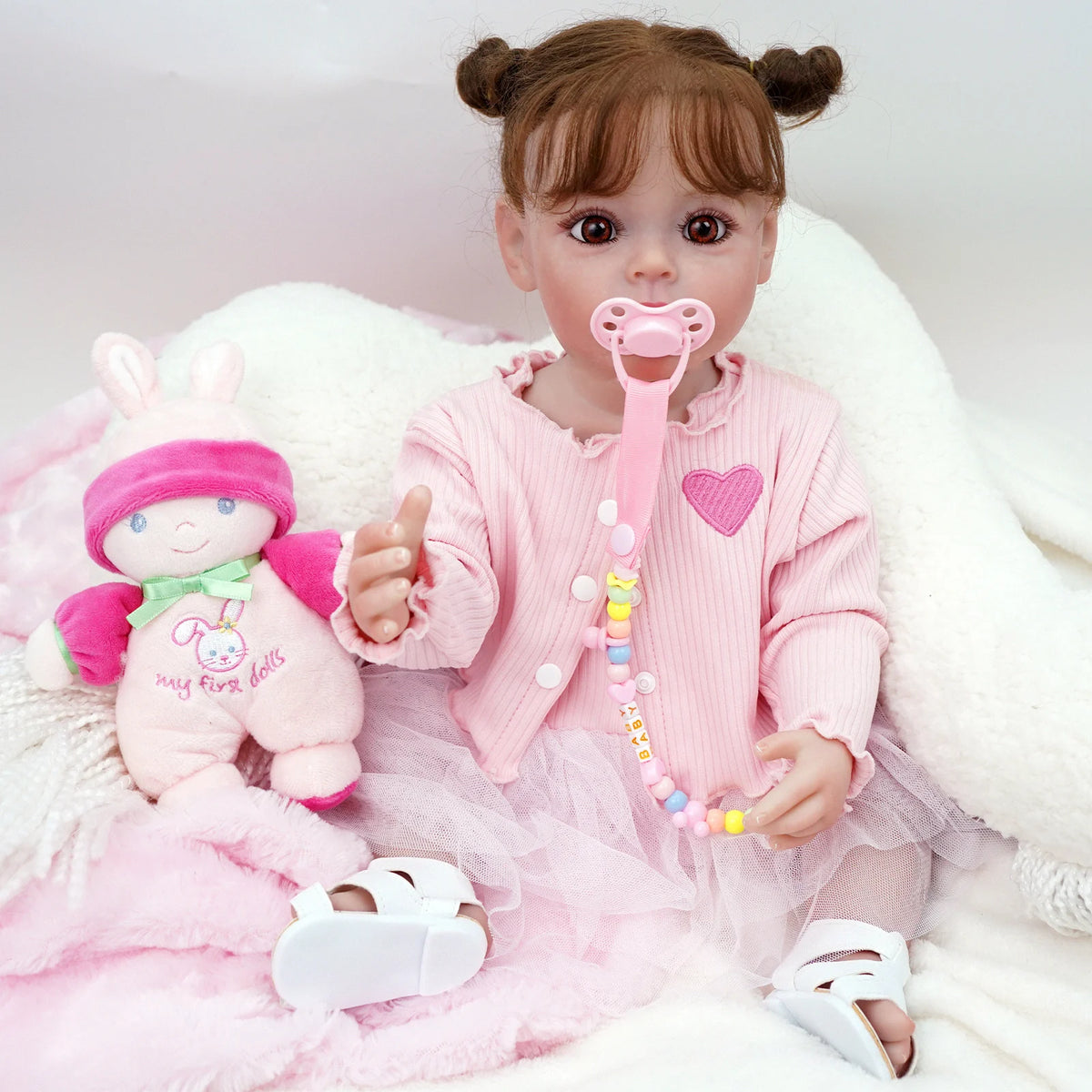 Bebê reborn menina de silicone 55cm - Manuela