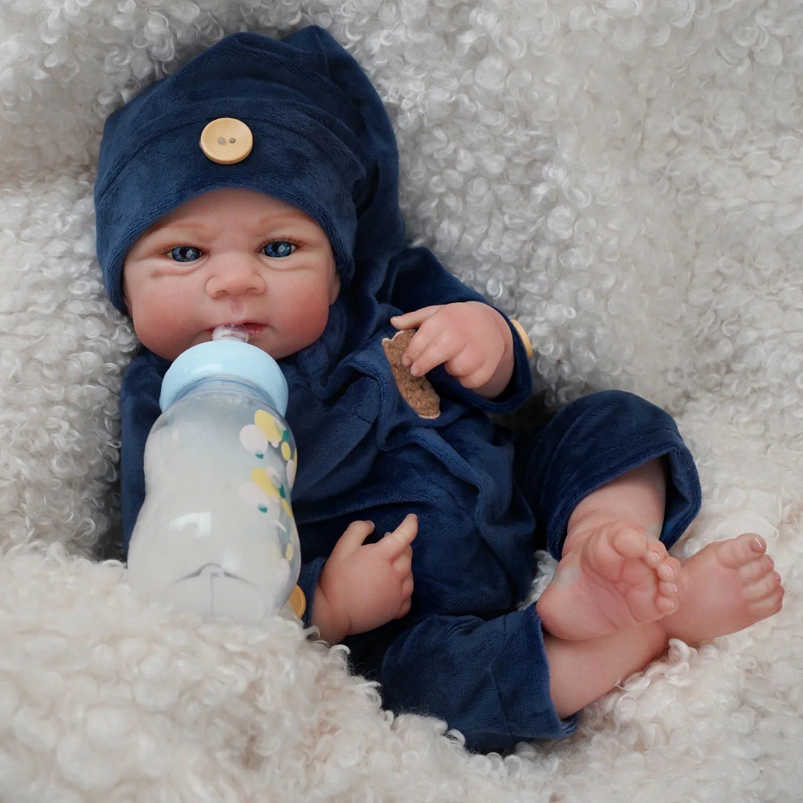 Bebê reborn Menino recem nacido de silicone com olhos azuis 48cm - Gael