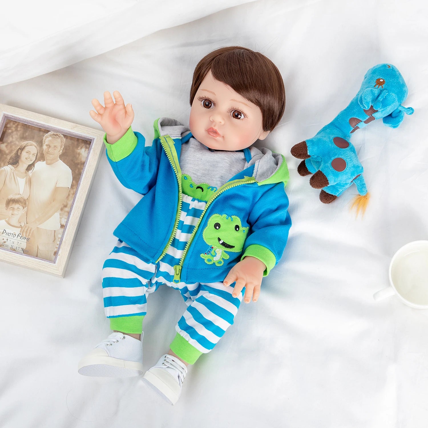 Bebê reborn menino girafa corpo de silicone 48cm - Arthur